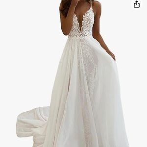 Never worn wedding dress size 24. White